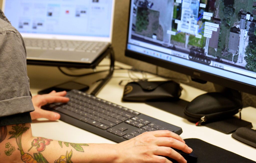 StraightUp Solar employee working on a solar design